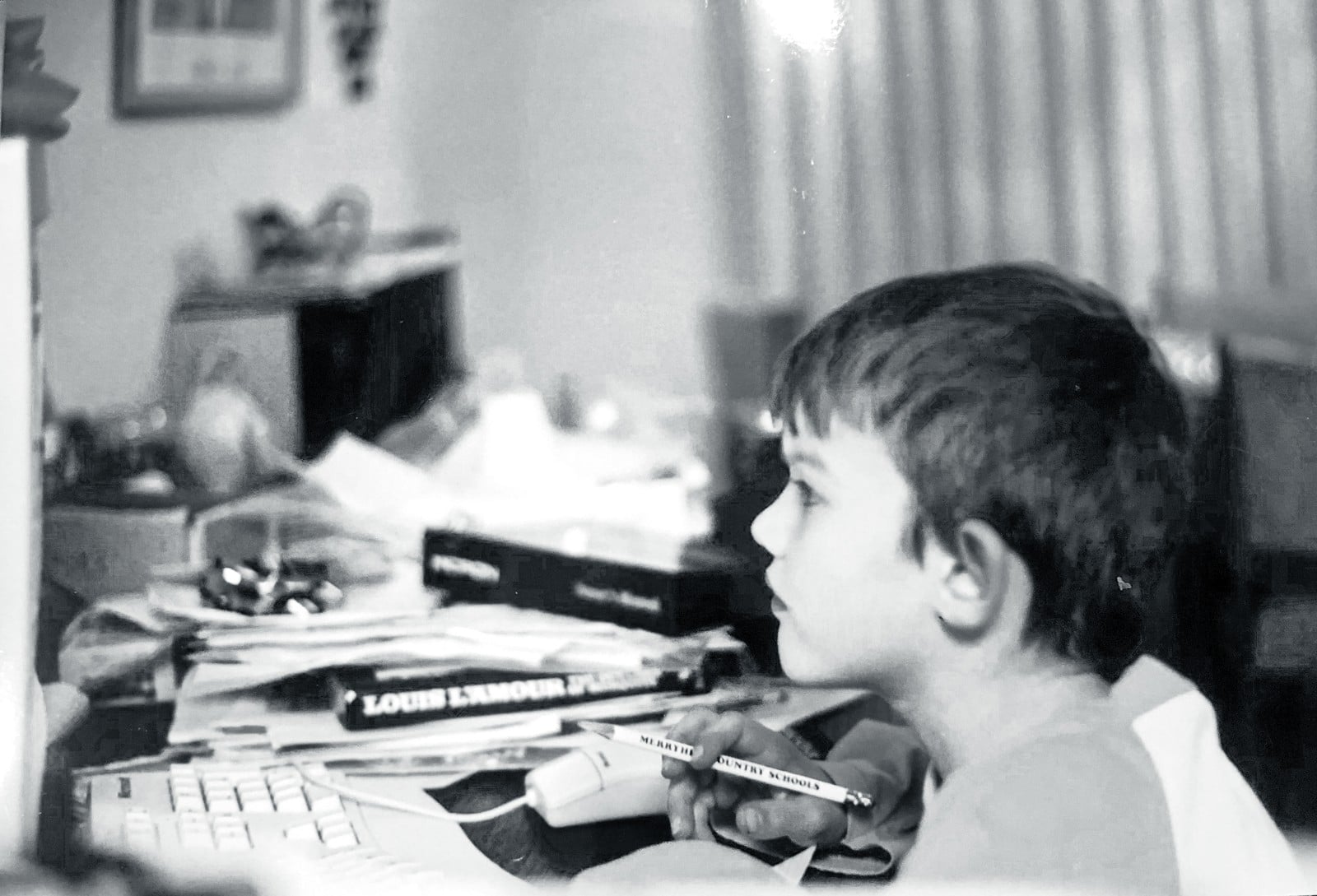 Young Andrew Sailer at a computer in 1994, the beginning of a 30-year journey building technology for founders